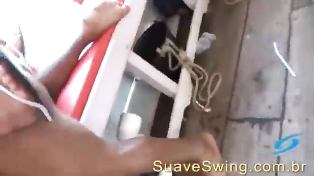 The suave guy has a great time with the swing