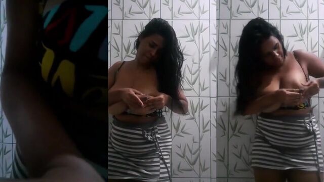 A black-skinned woman from Bahia wants to suck a nice breast full of milk