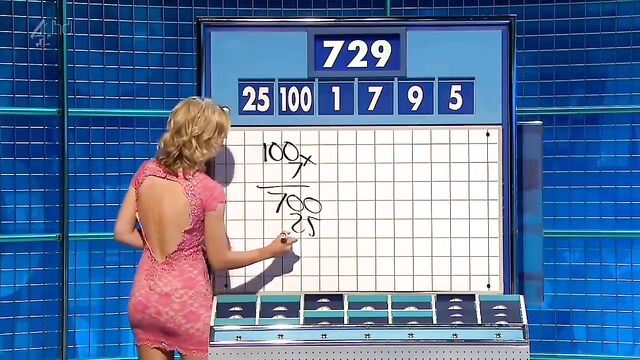 Rachel Riley accepts the Jerk Off Challenge while wearing a pink dress and showing off her tight ass