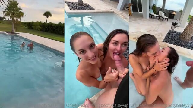 A man has a threesome with two girls in the pool