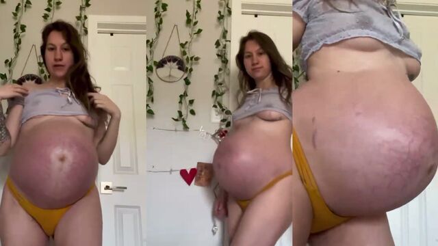 A huge belly of a pregnant slut is very attractive