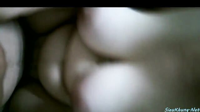 Beautiful girl takes off her bra to show her boobs