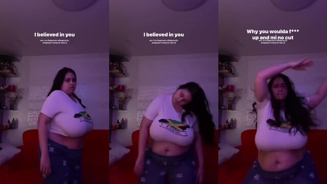 A fat woman shows her belly while dancing