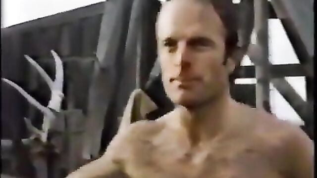 A woman is getting a blowjob from a man in this steamy scene