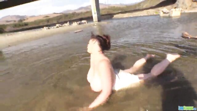 A beautiful woman with a huge pair of tits