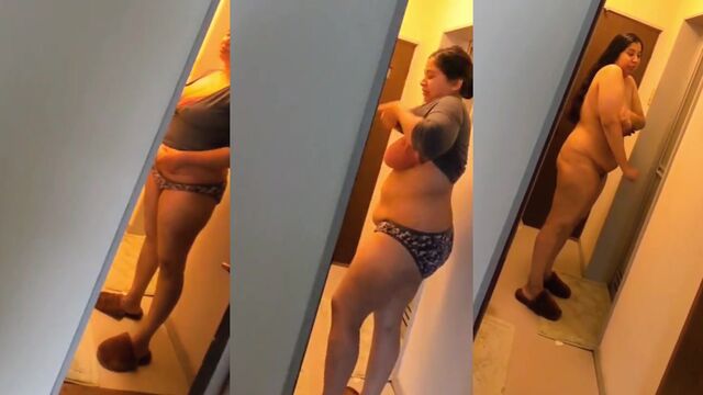 A chubby Indian NRI woman exposes her big tits on camera