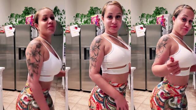 A thick Mexican woman with a big ass performs at her job