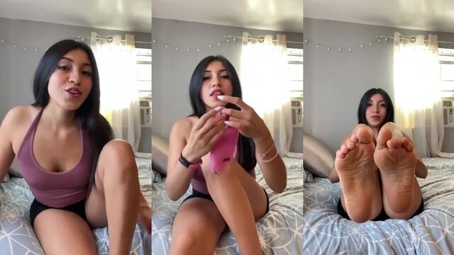 College girl worships the feet of a guy in return for him jerking off