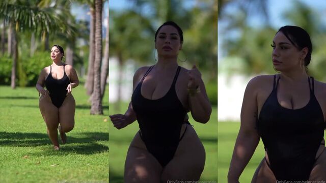 Oiled twerking with a big natural ass in booty shorts