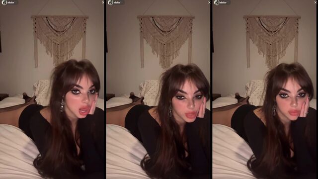 Brunette with siren eye fucks on the bed during TikTok live