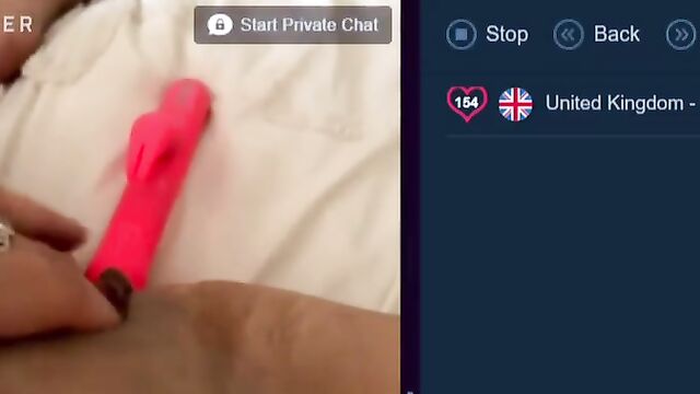 A cute British girl plays with a vibrator and shows her wet pussy
