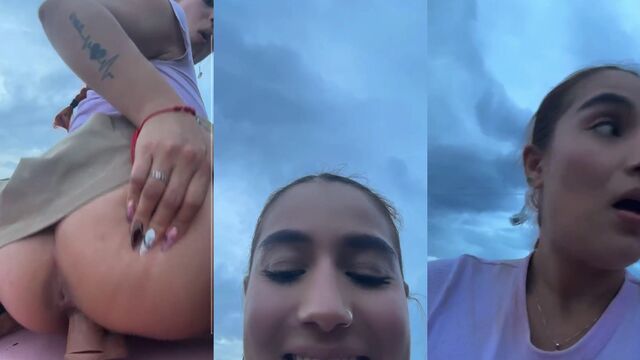 A pretty woman has sex on the side of the road