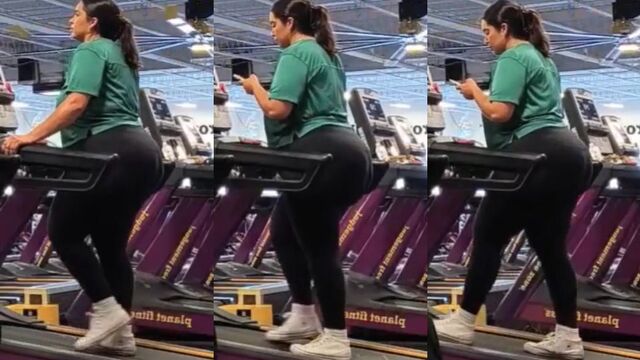 The fat black woman works out her ass at the gym with intensity