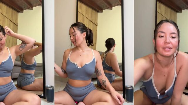 Cute petite Asian girl is teasing in public