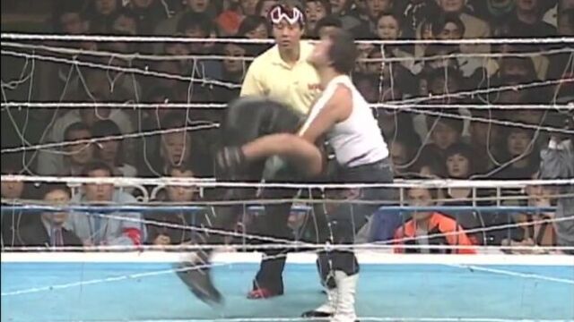Masahiro Chono vs. Atsushi Onita (No Rope Explosive Barbed Wire Death Match)