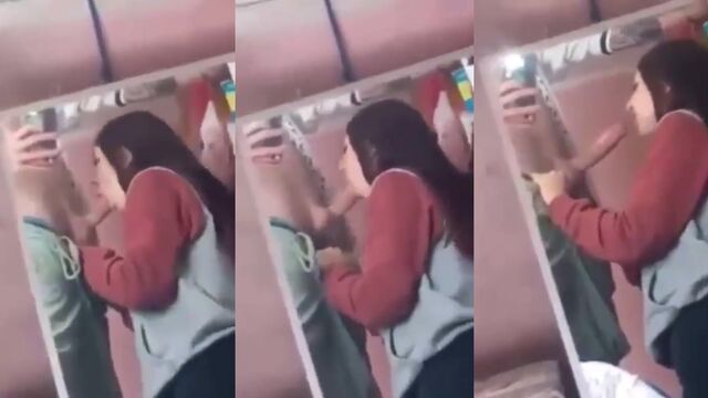 A girl plays with a mirror and her head, exploring new poses