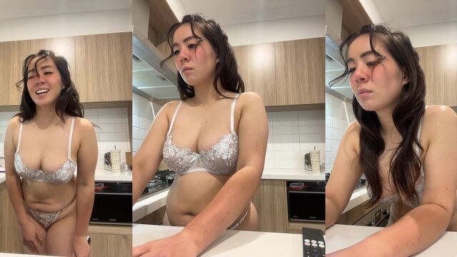 A cute petite Asian girl is teasing in public place
