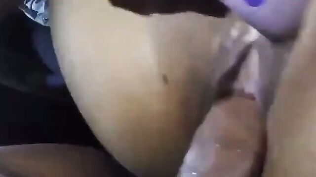A man masturbates in the parking lot of a bank