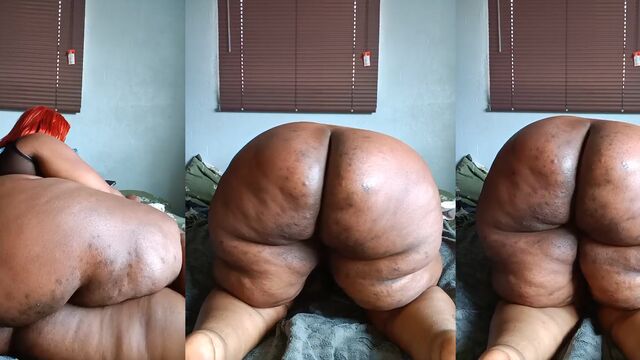 A fat black woman shows her huge African ass during a stripping session