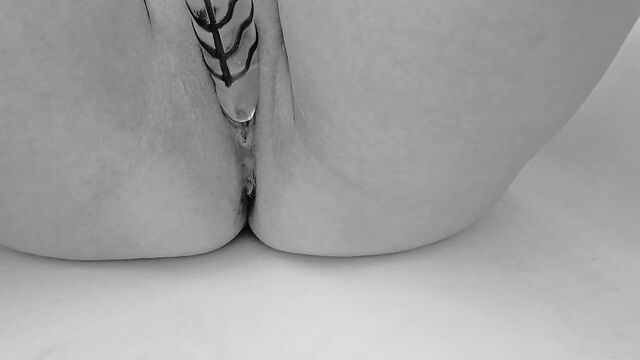 A PAWG plays with a big dildo in the shower, teasing and more