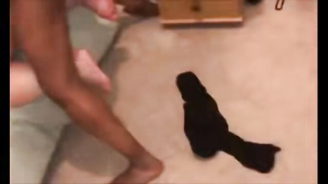 A man fucks a woman from the back in doggy style
