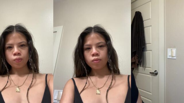 Cute petite Asian girl doing a shower tease