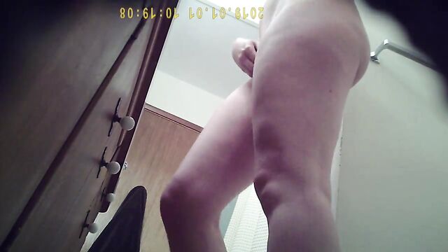 A girl was caught showering, her big tits and ass were visible