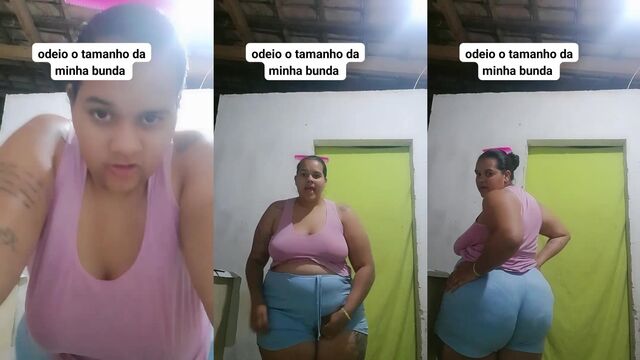 A fat woman shows her huge boobs and shakes them with pleasure