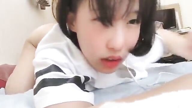 Cute Japanese girl masturbating with her toy