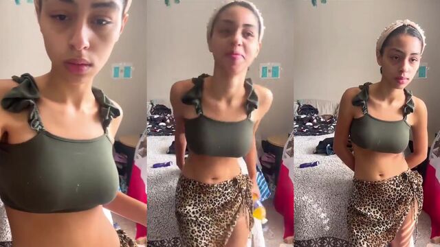 Hot girl exibida in the style of catwalk through the streets